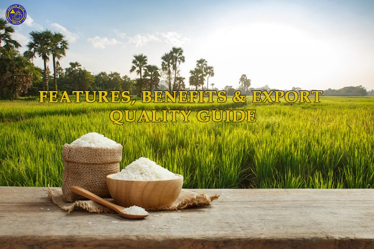 Bowl and sack of white rice placed on a wooden table with lush green rice fields in the background