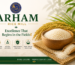 Premium rice grains in a wooden bowl with fresh rice plants and Arham Rice Mill branding highlighting field-to-table rice excellence